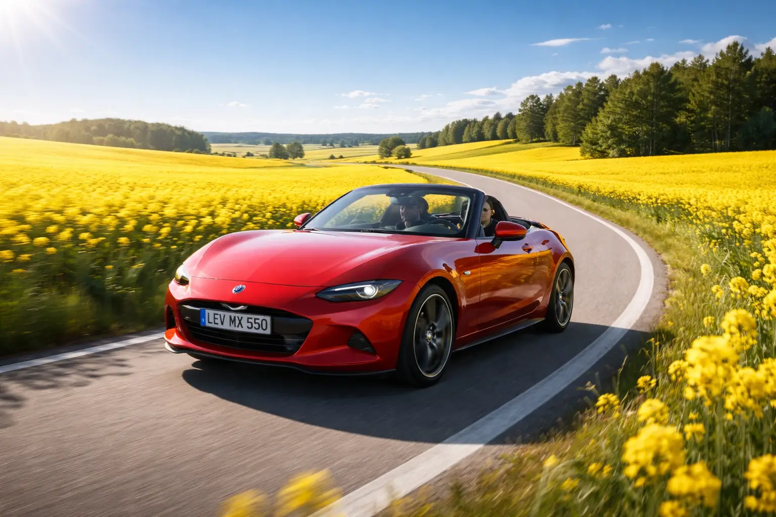 Silverfärgad cabriolet vid hav och klippor